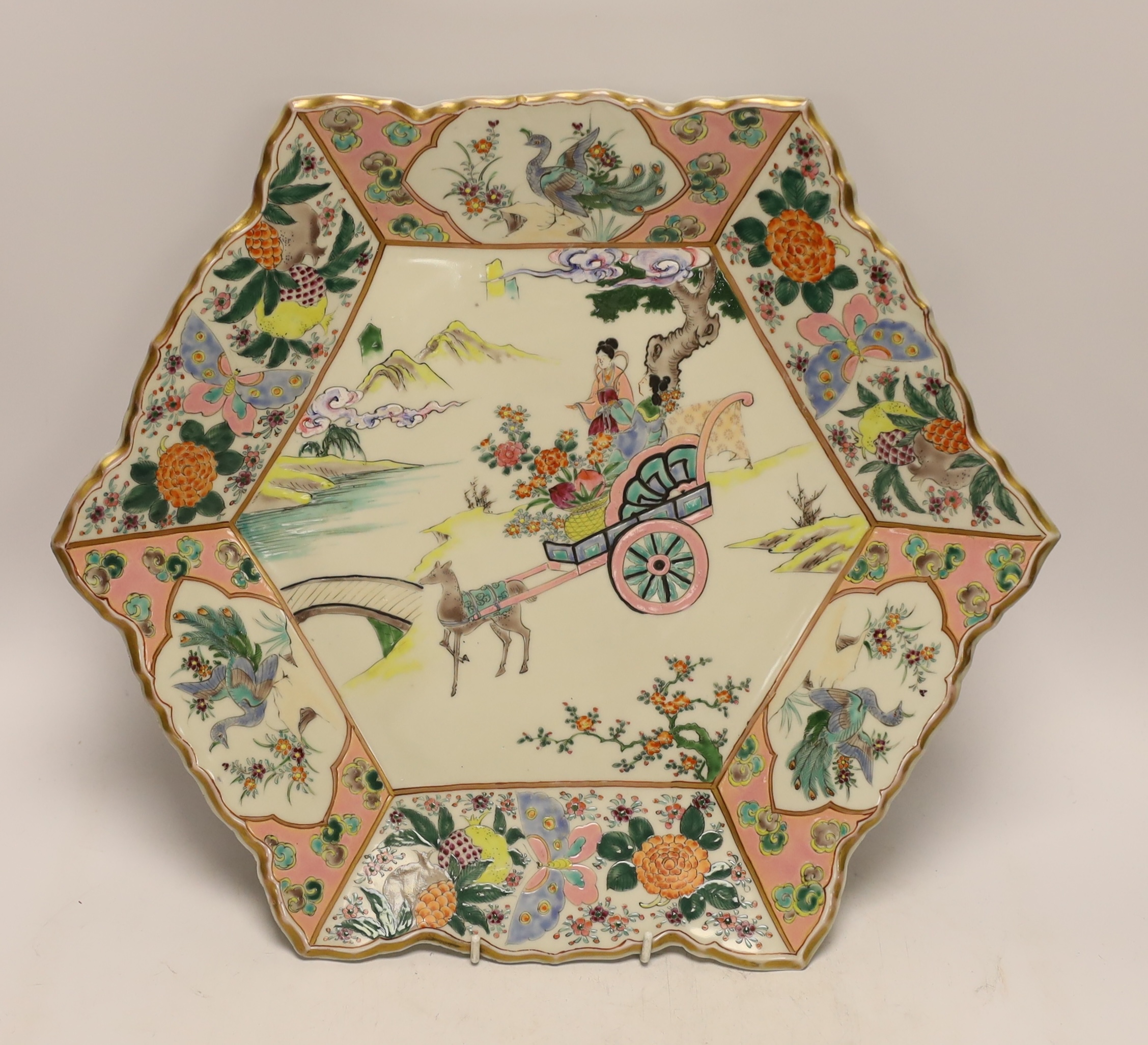 A large early 20th century Japanese enamelled porcelain hexagonal dish, 43cm